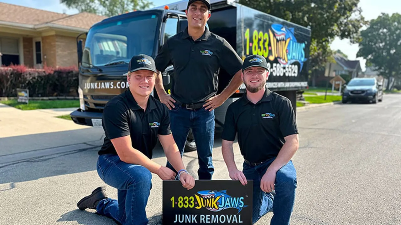 Junk Jaws crew clearing out a garage.