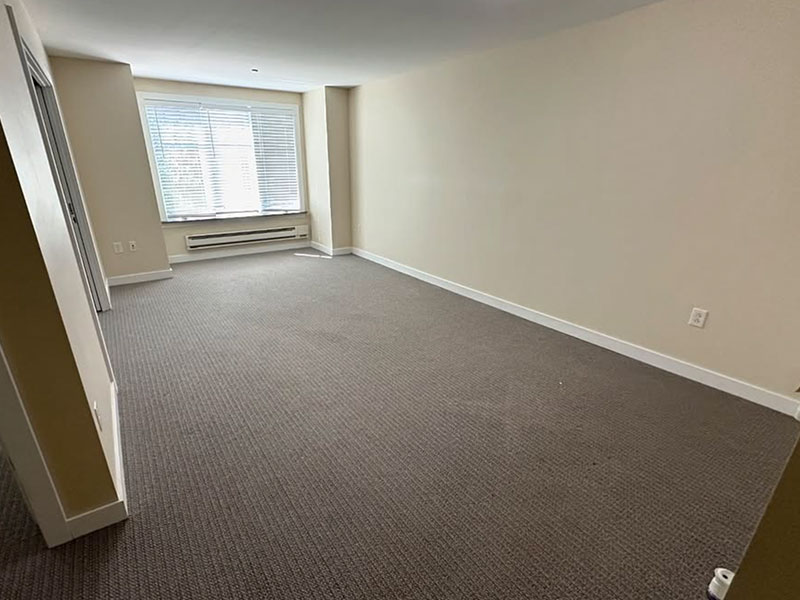 The same Chicago room completely emptied after Junk Jaws hauled everything away.