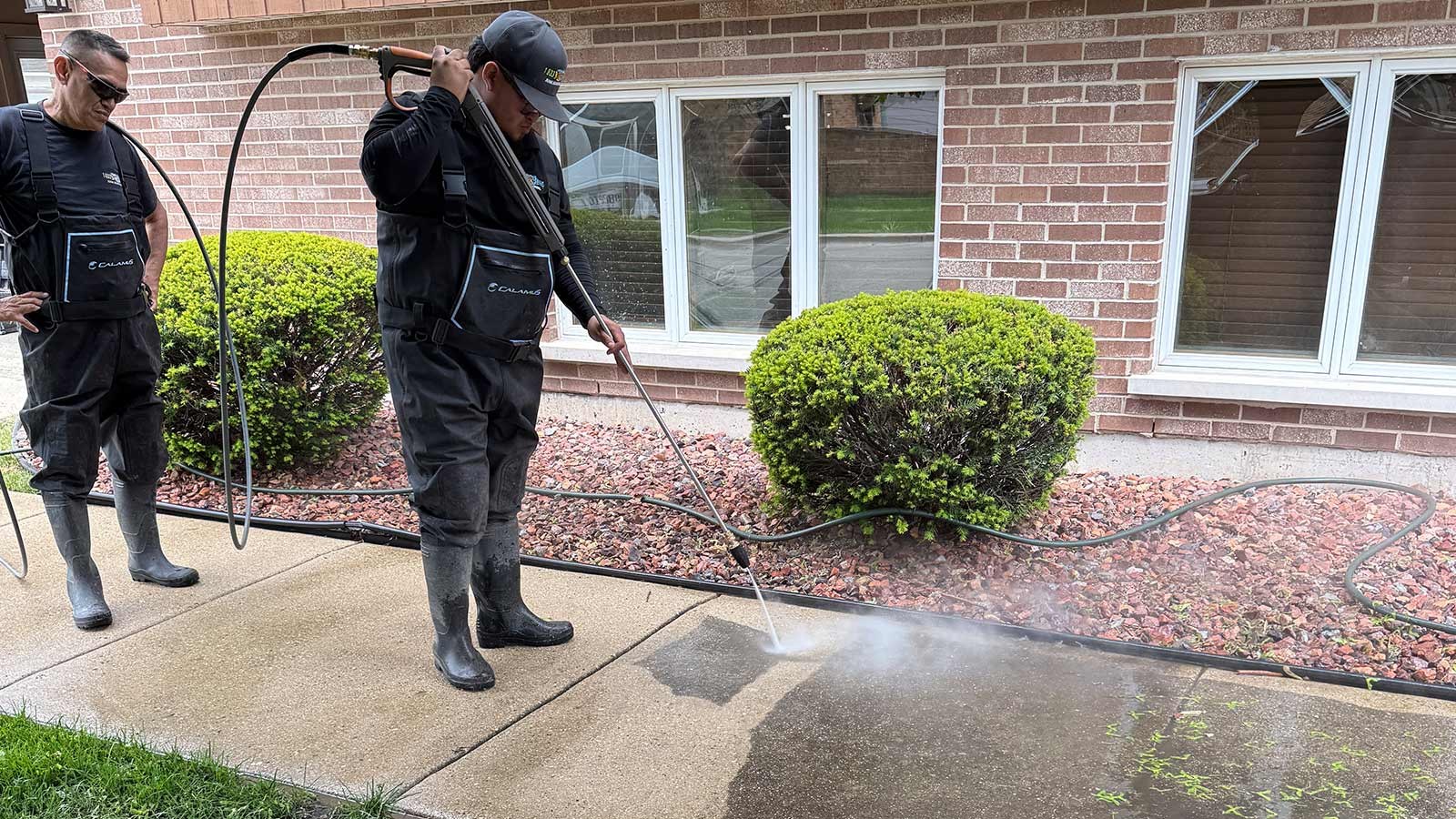 Power washing a driveway in Chicago.