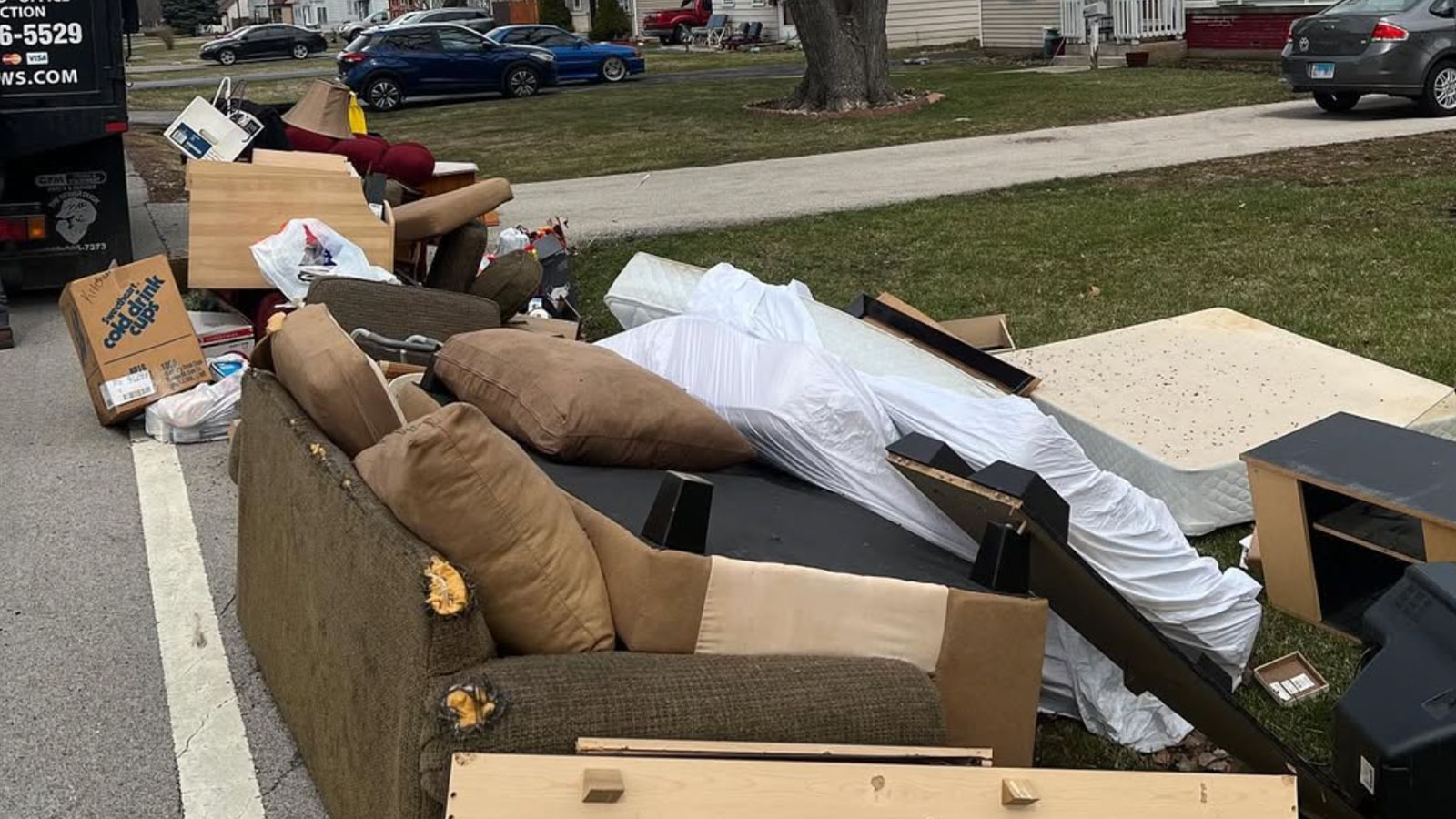 Junk Jaws crew removing unwanted items from a Chicago house.